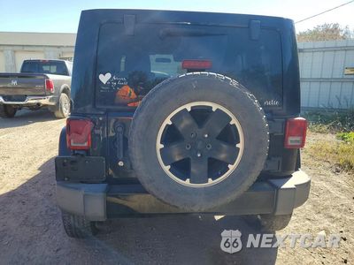 Zdjęcie 6 z 13 samochodu: 2012 JEEP WRANGLER UNLIMITED SAHARA VIN:1C4BJWEG7CL255536 - miniatura