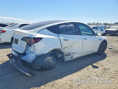Trzecie zdjęcie samochodu z tyłu: 2023 TESLA MODEL Y VIN:7SAYGDEE6PF900409 - miniatura