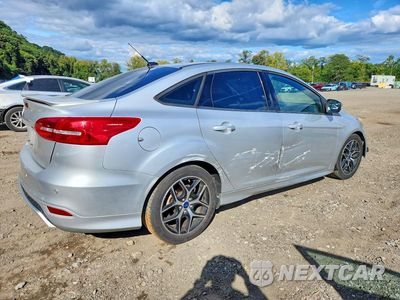 Trzecie zdjęcie samochodu z tyłu: 2015 FORD FOCUS SE VIN:1FADP3F21FL221062 - miniatura