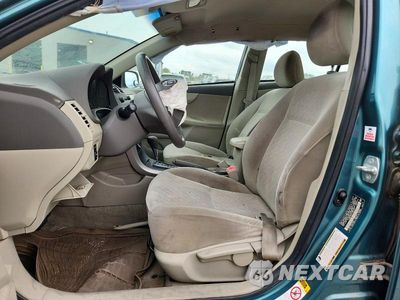 Zdjęcie 7 z 12 samochodu: 2009 TOYOTA COROLLA LE VIN:JTDBL40E19J009347 - miniatura