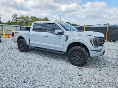 Czwarte zdjęcie samochodu z boku: 2023 FORD F150 SUPERCREW VIN:1FTEW1E80PFB92357 - miniatura