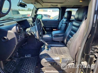 Zdjęcie 7 z 13 samochodu: 2006 HUMMER H2 VIN:5GRGN23U06H103129 - miniatura