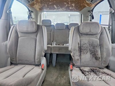 Zdjęcie 10 z 13 samochodu: 2005 DODGE GRAND CARAVAN SXT VIN:2D4GP44L95R557317 - miniatura