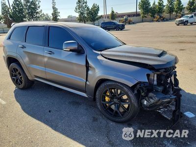 Czwarte zdjęcie samochodu z boku: 2018 JEEP GRAND CHEROKEE TRACKHAWK VIN:1C4RJFN94JC315091 - miniatura
