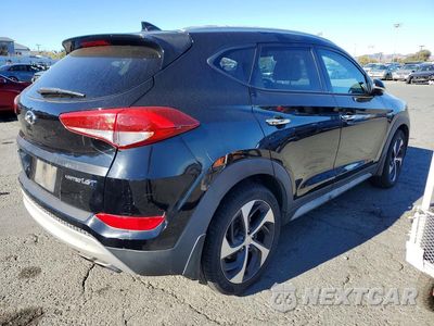 Trzecie zdjęcie samochodu z tyłu: 2018 HYUNDAI TUCSON LIMITED VIN:KM8J33A29JU780759 - miniatura