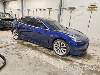 Czwarte zdjęcie samochodu z boku: 2018 TESLA MODEL 3 VIN:5YJ3E1EB7JF088482 - miniatura
