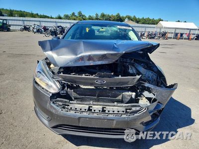 Piąte zdjęcie samochodu w środku: 2017 FORD FOCUS S VIN:1FADP3E26HL326488 - miniatura