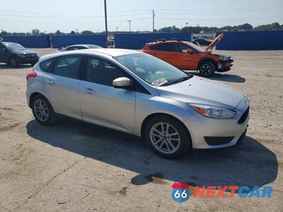 Czwarte zdjęcie samochodu z boku: 2018 FORD FOCUS SE VIN:1FADP3K2XJL228526 - miniatura