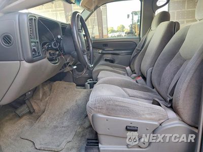 Zdjęcie 7 z 13 samochodu: 2003 CHEVROLET TAHOE C1500 VIN:1GNEC13V03R146559 - miniatura