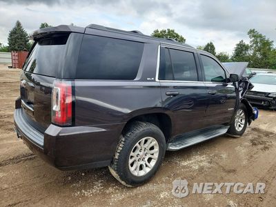 Trzecie zdjęcie samochodu z tyłu: 2016 GMC YUKON SLE VIN:1GKS2AKC2GR429943 - miniatura
