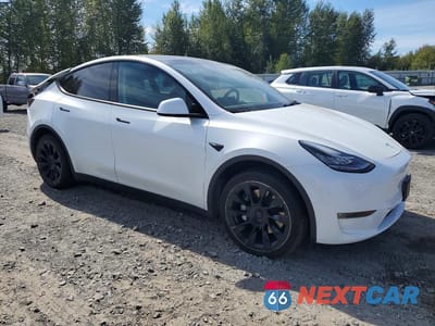 Czwarte zdjęcie samochodu z boku: 2022 TESLA MODEL Y VIN:7SAYGDEE5NF481515 - miniatura