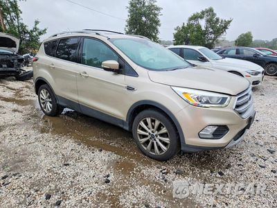 Czwarte zdjęcie samochodu z boku: 2017 FORD ESCAPE TITANIUM VIN:1FMCU9JD0HUB48334 - miniatura