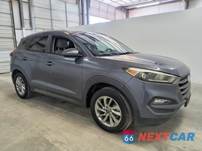 Czwarte zdjęcie samochodu z boku: 2016 HYUNDAI TUCSON SE VIN:KM8J33A48GU196573 - miniatura