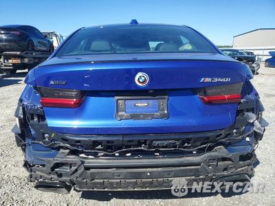 Zdjęcie 6 z 12 samochodu: 2023 BMW M340XI VIN:3MW49FF06P8D17411 - miniatura