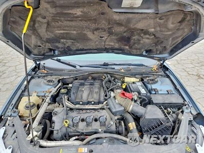 Zdjęcie 11 z 12 samochodu: 2011 FORD FUSION SE VIN:3FAHP0HG5BR178558 - miniatura