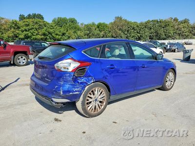 Trzecie zdjęcie samochodu z tyłu: 2015 FORD FOCUS TITANIUM VIN:1FADP3N20FL369723 - miniatura