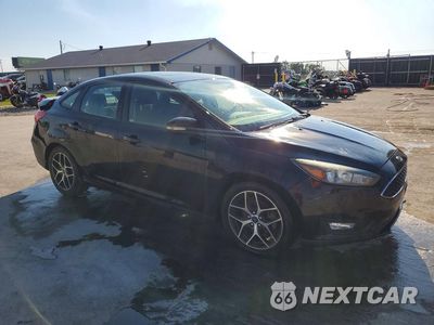 Czwarte zdjęcie samochodu z boku: 2017 FORD FOCUS SEL VIN:1FADP3H28HL313852 - miniatura