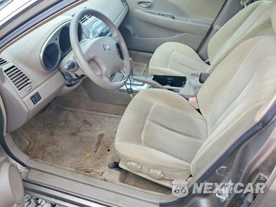 Zdjęcie 7 z 12 samochodu: 2003 NISSAN ALTIMA 2.5 VIN:1N4AL11D53C264827 - miniatura