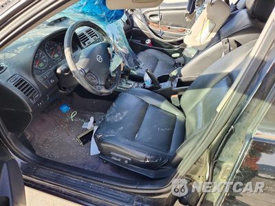 Zdjęcie 7 z 12 samochodu: 2003 NISSAN MAXIMA GXE VIN:JN1DA31A43T433012 - miniatura