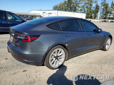 Trzecie zdjęcie samochodu z tyłu: 2022 TESLA MODEL 3 VIN:5YJ3E1EB0NF192981 - miniatura