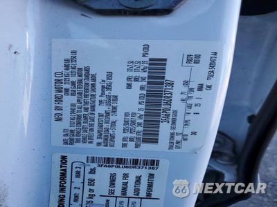 Zdjęcie 12 z 12 samochodu: 2013 FORD FUSION SE HYBRID VIN:3FA6P0LU6DR371387 - miniatura