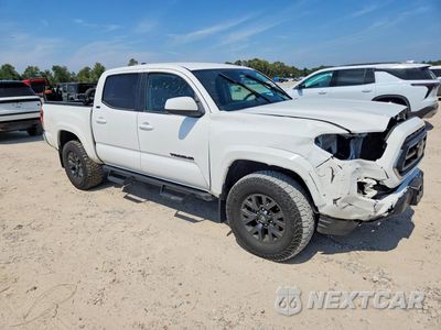 Czwarte zdjęcie samochodu z boku: 2023 TOYOTA TACOMA SR5 V6 VIN:3TMAZ5CN4PM198684 - miniatura
