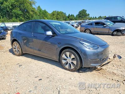 Czwarte zdjęcie samochodu z boku: 2022 TESLA MODEL Y VIN:7SAYGDEEXNF310131 - miniatura