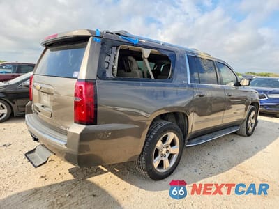 Trzecie zdjęcie samochodu z tyłu: 2016 CHEVROLET SUBURBAN C1500 LTZ VIN:1GNSCJKC1GR392576 - miniatura