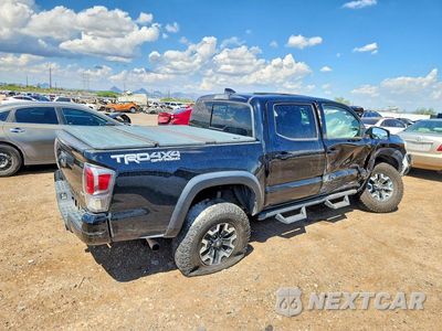 Trzecie zdjęcie samochodu z tyłu: 2021 TOYOTA TACOMA TRD OFF-ROAD VIN:3TMCZ5AN6MM412047 - miniatura