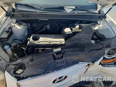 Zdjęcie 12 z 13 samochodu: 2010 HYUNDAI SANTA FE GLS VIN:5NMSG3AB7AH401326 - miniatura