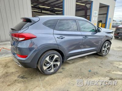 Trzecie zdjęcie samochodu z tyłu: 2017 HYUNDAI TUCSON SPORT VIN:KM8J33A29HU387015 - miniatura