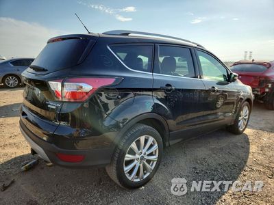 Trzecie zdjęcie samochodu z tyłu: 2017 FORD ESCAPE TITANIUM VIN:1FMCU0J9XHUA75514 - miniatura