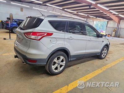 Trzecie zdjęcie samochodu z tyłu: 2014 FORD ESCAPE SE VIN:1FMCU9G96EUE45400 - miniatura