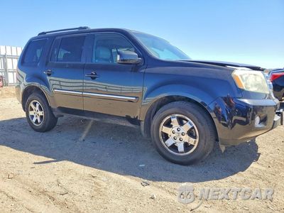 Czwarte zdjęcie samochodu z boku: 2011 HONDA PILOT TOURING VIN:5FNYF4H98BB086268 - miniatura