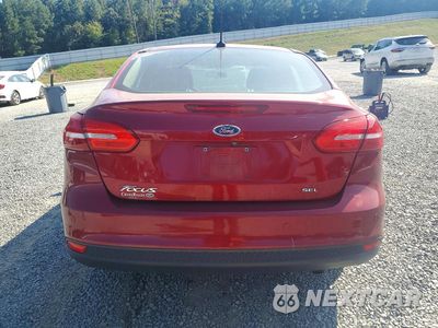 Zdjęcie 6 z 12 samochodu: 2017 FORD FOCUS SEL VIN:1FADP3H28HL212438 - miniatura