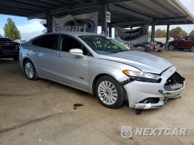 Czwarte zdjęcie samochodu z boku: 2016 FORD FUSION SE PHEV VIN:3FA6P0PU4GR315995 - miniatura