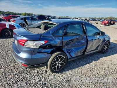 Trzecie zdjęcie samochodu z tyłu: 2018 FORD FOCUS VIN:1FADP3H22JL201912 - miniatura