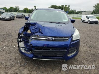 Piąte zdjęcie samochodu w środku: 2016 FORD ESCAPE SE VIN:1FMCU9G90GUA93644 - miniatura