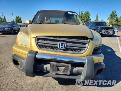 Piąte zdjęcie samochodu w środku: 2003 HONDA PILOT EXL VIN:2HKYF18513H545168 - miniatura