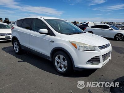 Czwarte zdjęcie samochodu z boku: 2015 FORD ESCAPE SE VIN:1FMCU9GXXFUA68599 - miniatura