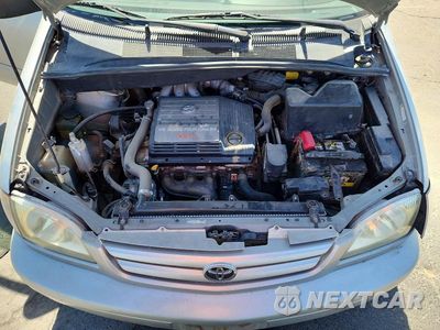Zdjęcie 12 z 14 samochodu: 2003 TOYOTA SIENNA LE VIN:4T3ZF13C03U518417 - miniatura