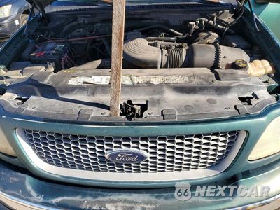 Zdjęcie 11 z 12 samochodu: 1999 FORD F150 VIN:1FTRX18L0XNC04513 - miniatura
