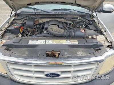 Zdjęcie 11 z 12 samochodu: 1999 FORD F150 VIN:2FTRX07W0XCA85941 - miniatura