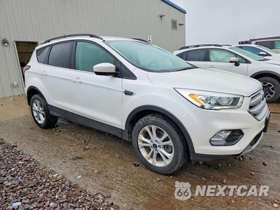 Czwarte zdjęcie samochodu z boku: 2018 FORD ESCAPE SEL VIN:1FMCU9HD6JUB38077 - miniatura