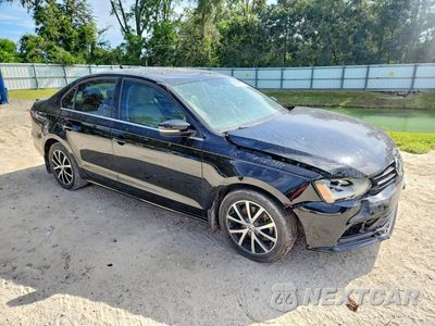 Czwarte zdjęcie samochodu z boku: 2017 VOLKSWAGEN JETTA SE VIN:3VWDB7AJ4HM296822 - miniatura