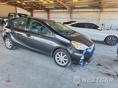 Czwarte zdjęcie samochodu z boku: 2012 TOYOTA PRIUS C FOUR VIN:JTDKDTB39C1031154 - miniatura
