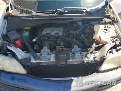 Zdjęcie 11 z 12 samochodu: 2003 PONTIAC MONTANA LUXURY VIN:1GMDX13E83D276736 - miniatura