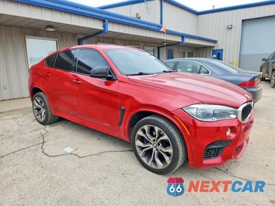 Czwarte zdjęcie samochodu z boku: 2017 BMW X6 M VIN:5YMKW8C52H0R43989 - miniatura