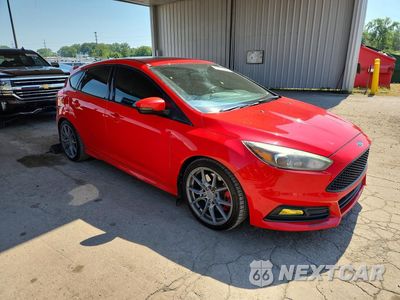 Czwarte zdjęcie samochodu z boku: 2017 FORD FOCUS ST VIN:1FADP3L94HL235297 - miniatura