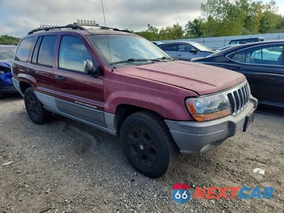Czwarte zdjęcie samochodu z boku: 1999 JEEP GRAND CHEROKEE LAREDO VIN:1J4GW58S7XC678876 - miniatura